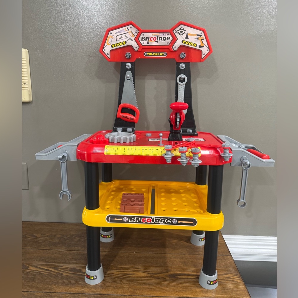 Kids Tool Playset - Red and Yellow Bricolage.  Has minor damage.